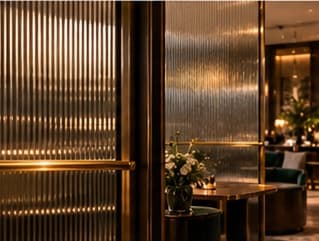 Committee Lounge — brass and glass architectural detail